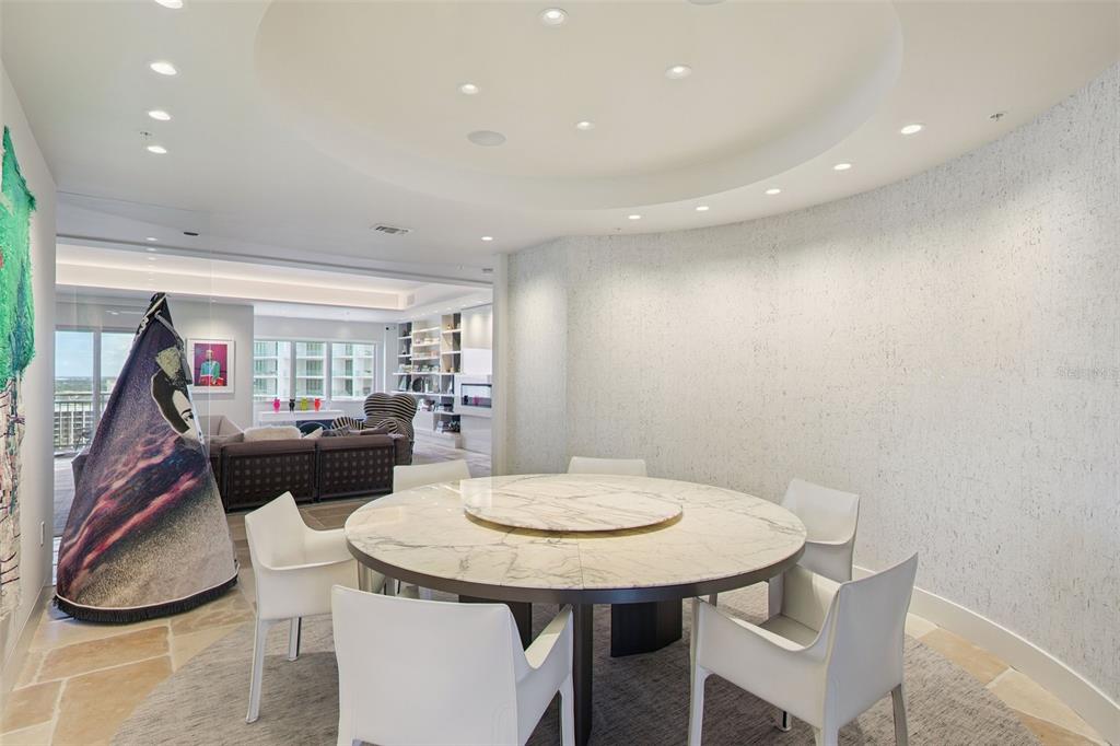 1111 Ritz Carlton Drive, Unit 1704 Sarasota, FL 34236 - Photo 20 of 53 a view of a dining room with furniture