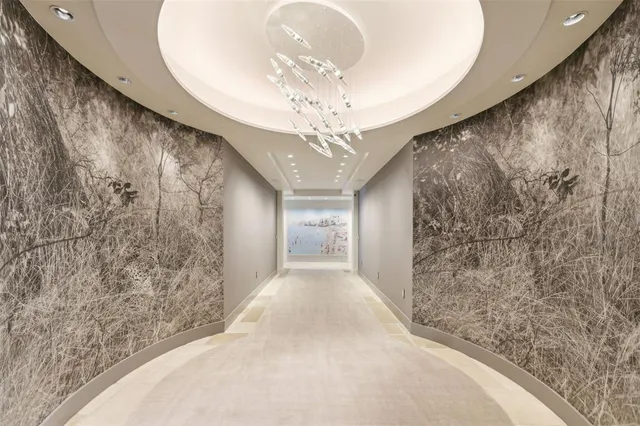 a view of a chandelier in a big room