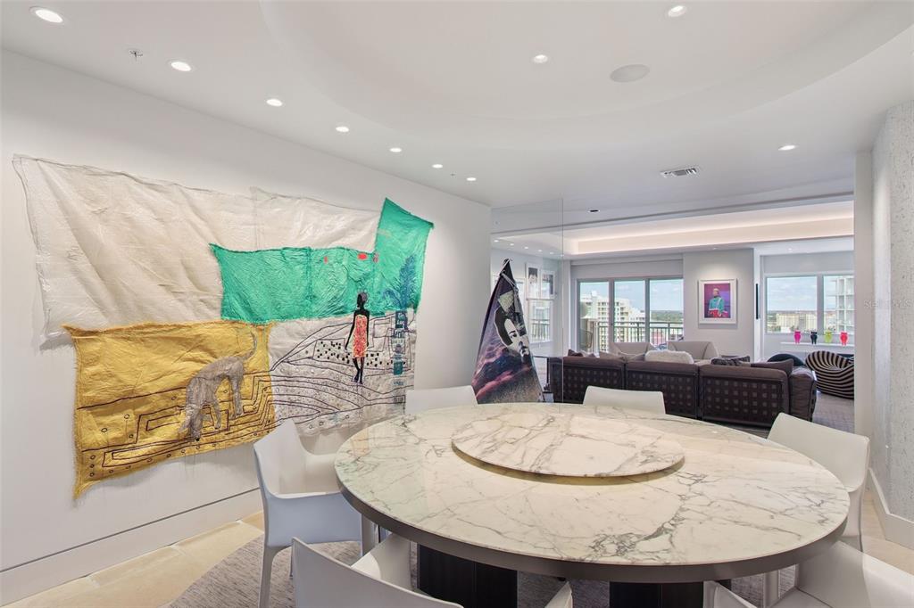 1111 Ritz Carlton Drive, Unit 1704 Sarasota, FL 34236 - Photo 21 of 53 a view of a dining room with furniture