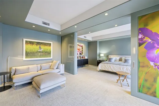 a bedroom with a bed and furniture