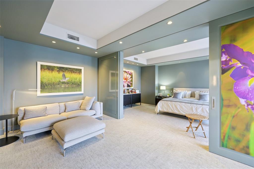 1111 Ritz Carlton Drive, Unit 1704 Sarasota, FL 34236 - Photo 34 of 53 a bedroom with furniture and a window