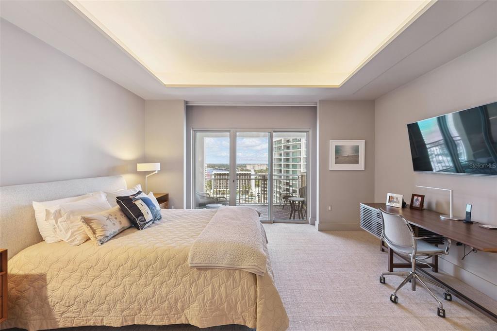 1111 Ritz Carlton Drive, Unit 1704 Sarasota, FL 34236 - Photo 40 of 53 a bedroom with a large bed and a window