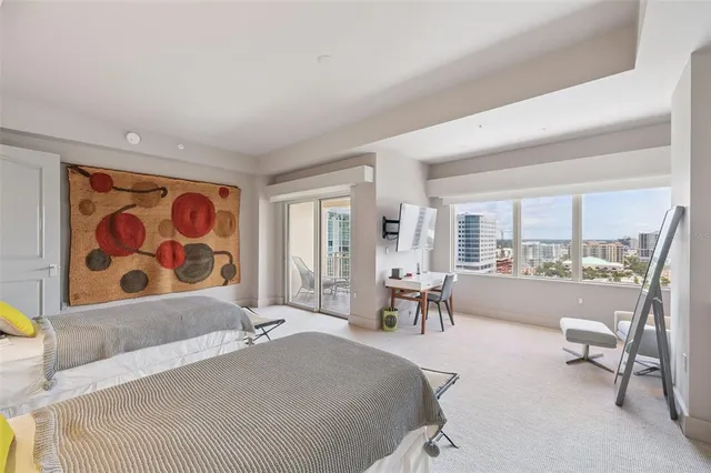 a view of a hallway with a chandelier