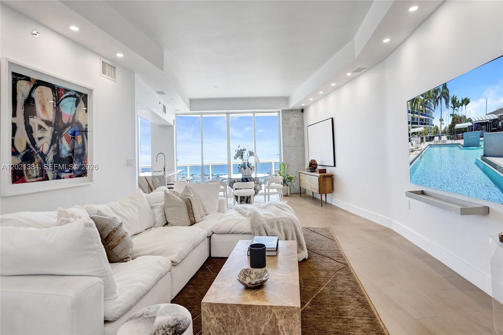 400 Alton Road, Unit PH11 Miami Beach, FL 33139 - Photo 7 of 49 a living room with furniture and a couch