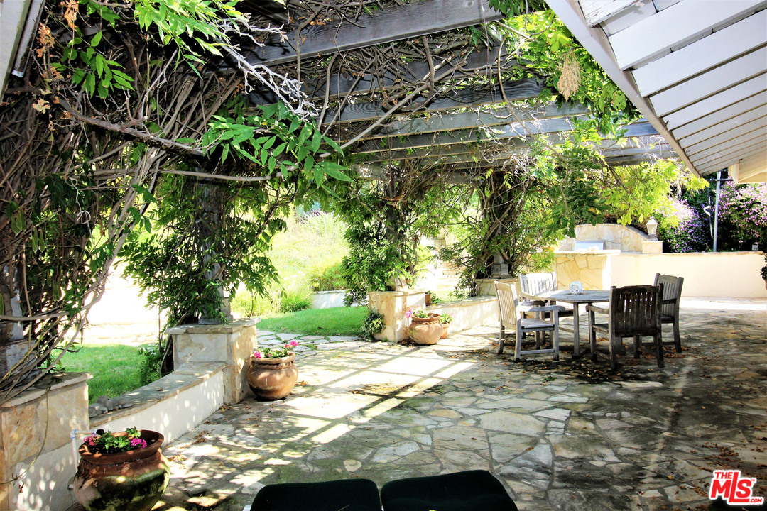 20219 Inland Lane Malibu, CA 90265 - Photo 10 of 28 a view of backyard with sitting area