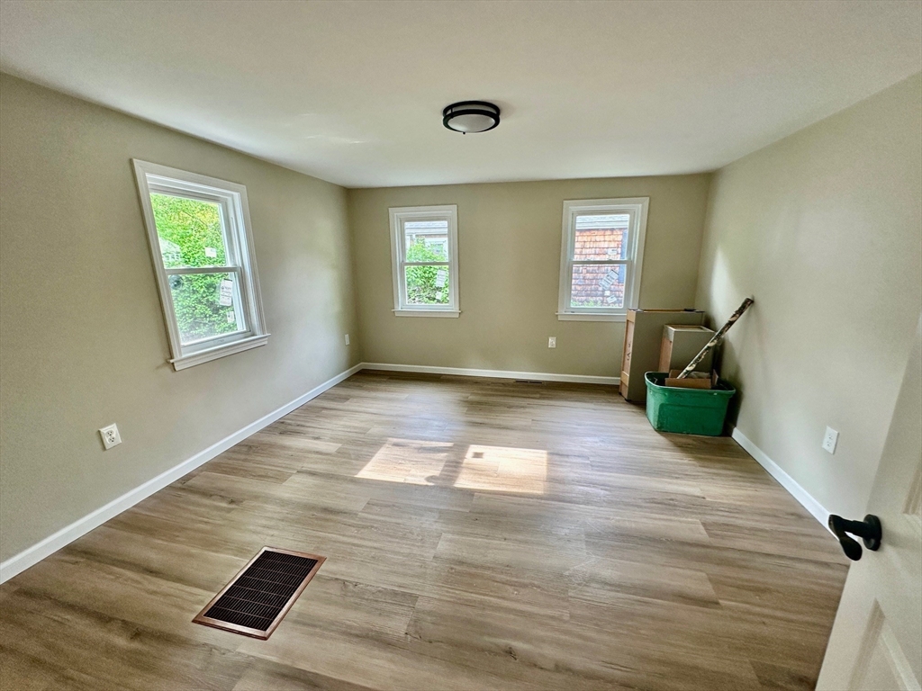 12 English Road Holbrook, MA 02343 - Photo 7 of 12 a view of an empty room with a window