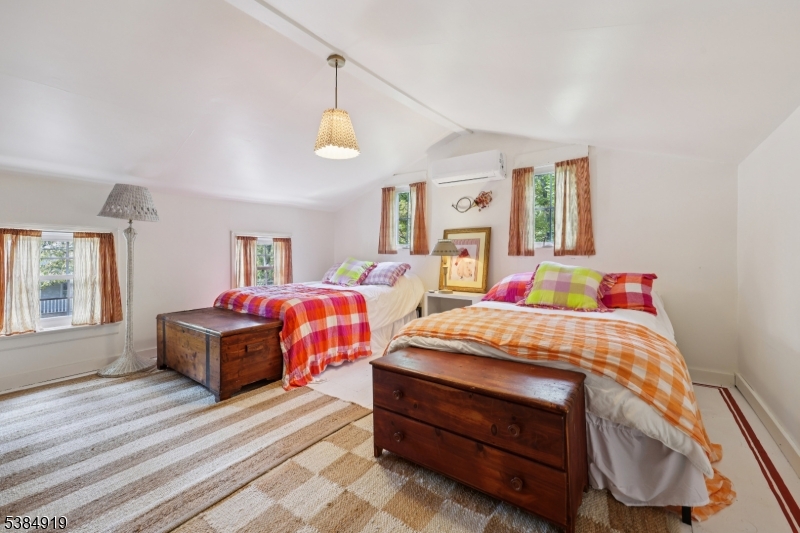 198 Libertyville Road Wantage, NJ 07461 - Photo 16 of 29 a bedroom with bed and wooden floor