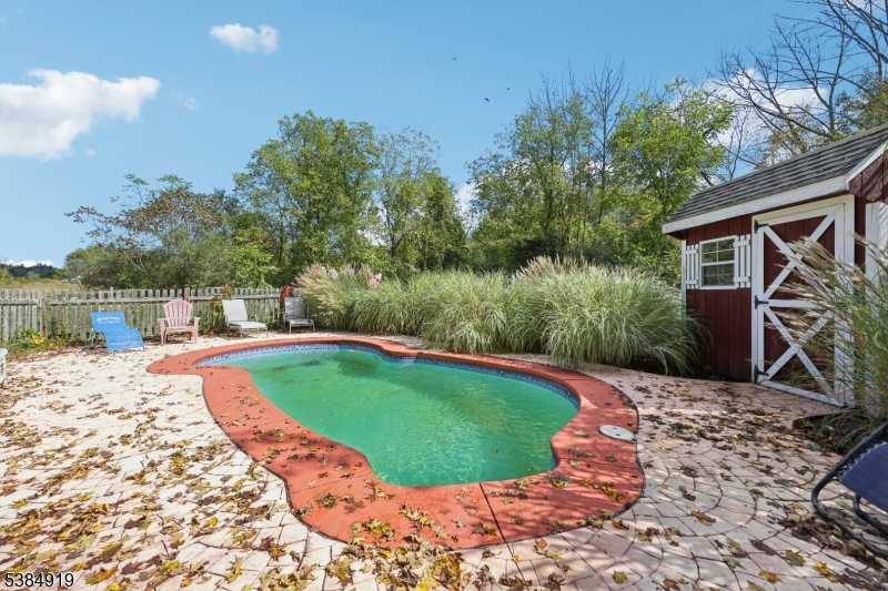 198 Libertyville Road Wantage, NJ 07461 - Photo 19 of 29 a view of a swimming pool with a patio