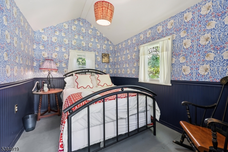 198 Libertyville Road Wantage, NJ 07461 - Photo 21 of 29 a view of a bedroom with furniture and a window