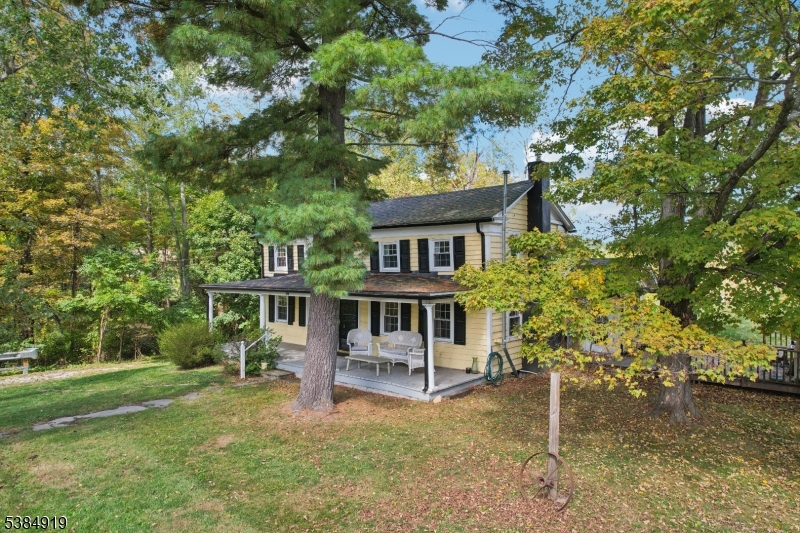 198 Libertyville Road Wantage, NJ 07461 - Photo 25 of 29 a view of a house with a yard