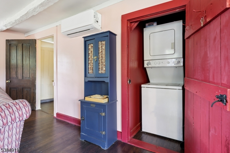 198 Libertyville Road Wantage, NJ 07461 - Photo 8 of 29 a living room with furniture and a wooden door