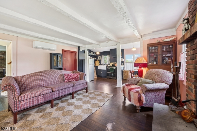 198 Libertyville Road Wantage, NJ 07461 - Photo 9 of 29 a living room with furniture a couch and large window