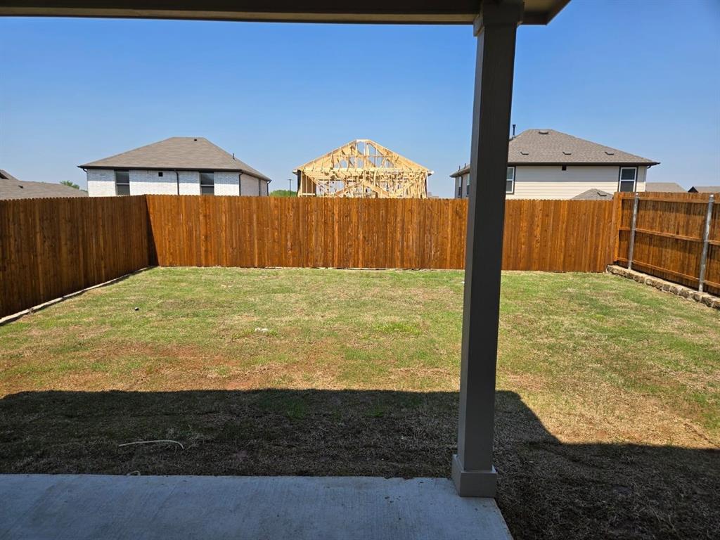 508 Weller Road McKinney, TX 75069 - Photo 15 of 16 Expansive backyard featuring a new wood privacy fence