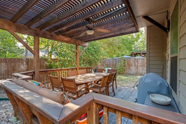 a view of sitting area with furniture and wooden floor