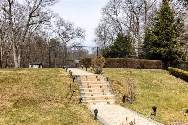 a backyard of a house with lots of green space