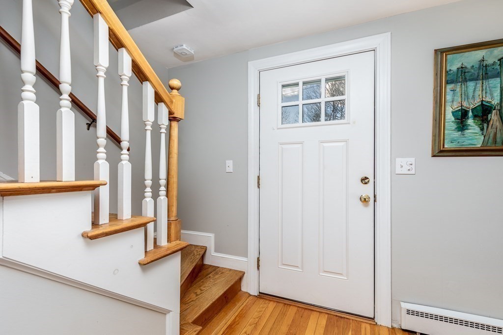 32 Norman Road Hamilton, MA 01982 - Photo 18 of 39 a view of an entryway with wooden floor and windows