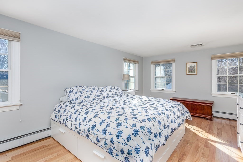 32 Norman Road Hamilton, MA 01982 - Photo 19 of 39 a bedroom with a large bed and a window