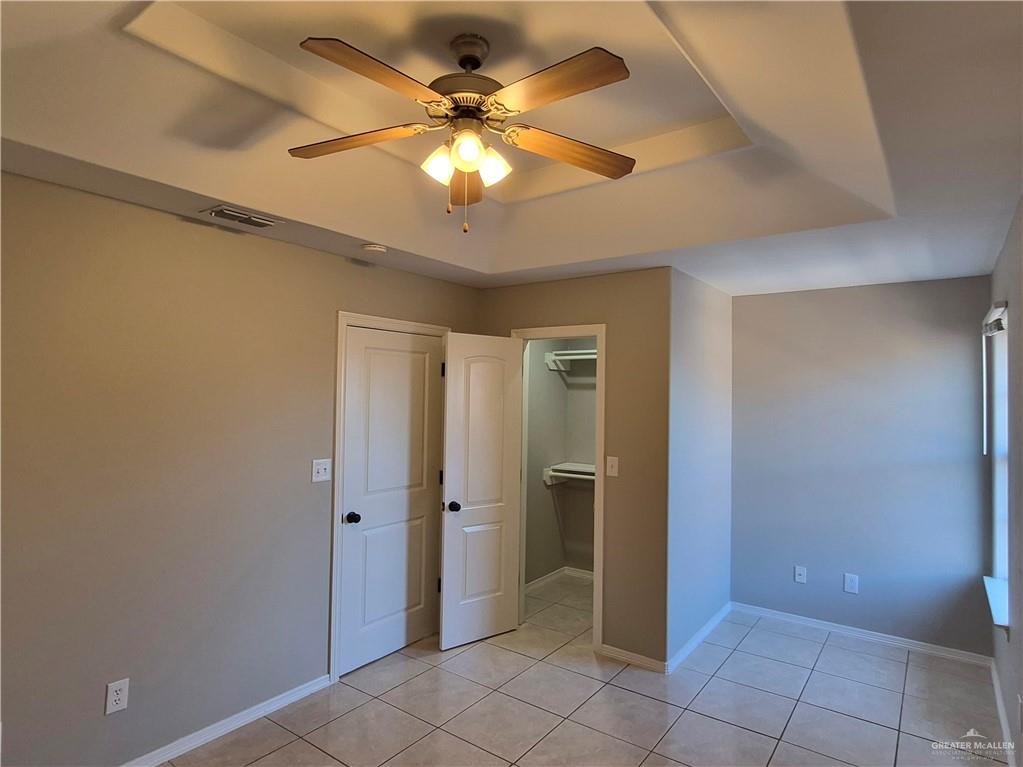 607 Jade Street, Unit 3 Edinburg, TX 78541 - Photo 19 of 19 a view of an empty room with a fan