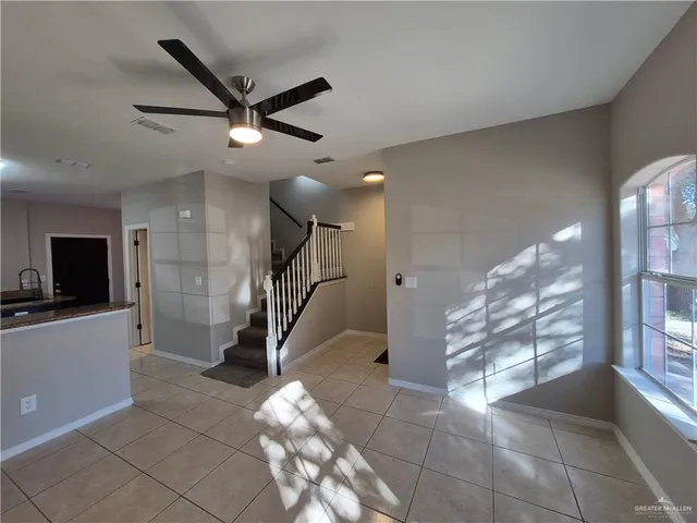 a view of entryway and hall with a window