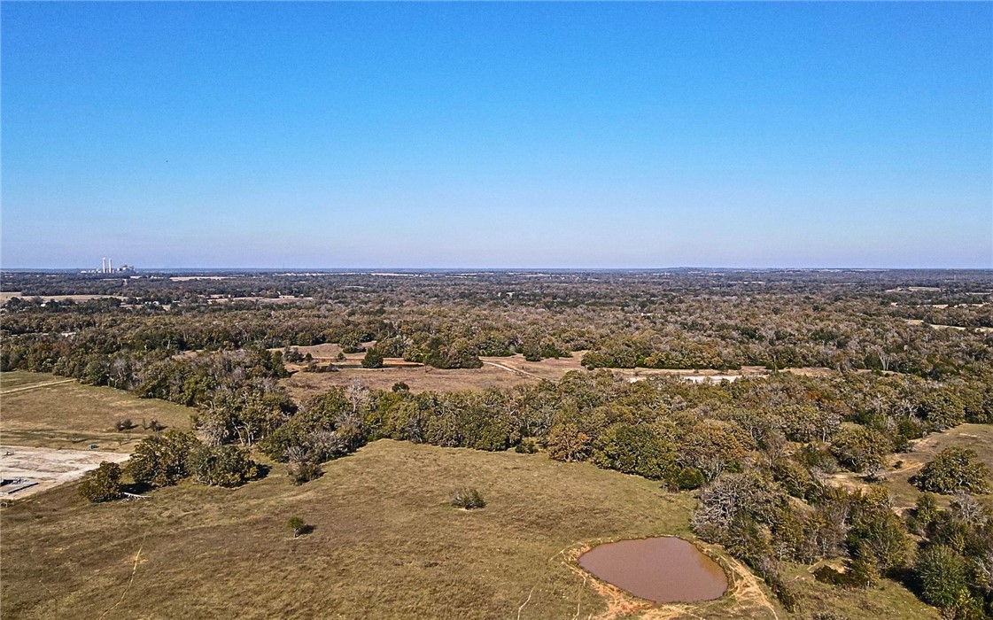 4834 Old Boone Prairie Road Franklin, TX 77856 - Photo 16 of 39 an aerial view of a house with a ocean view