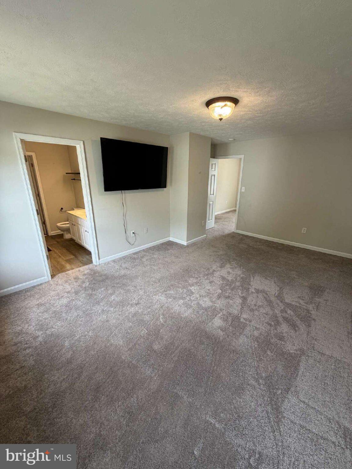 313 3rd Street Colonial Beach, VA 22443 - Photo 8 of 36 Spacious, inviting living area awaits.