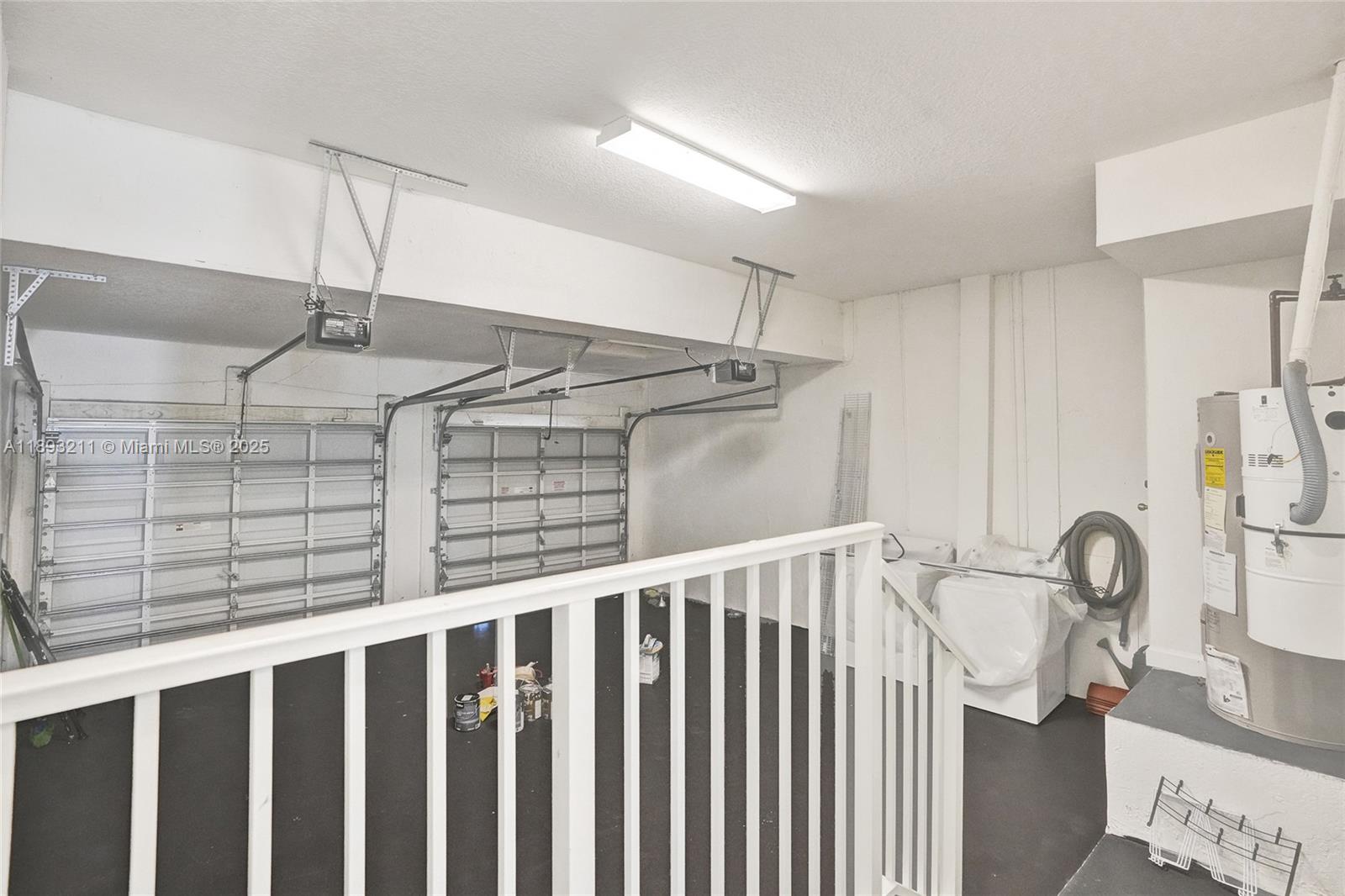 7722 Southwest 188th Terrace Cutler Bay, FL 33157 - Photo 24 of 89 a view of a hallway with wooden floor