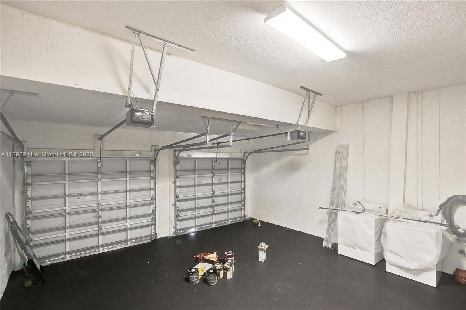 7722 Southwest 188th Terrace Cutler Bay, FL 33157 - Photo 25 of 89 a view of a room with racks on the wall