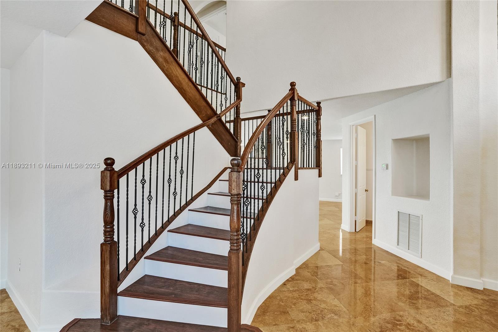 7722 Southwest 188th Terrace Cutler Bay, FL 33157 - Photo 31 of 89 a view of staircase with wooden floor and a rug