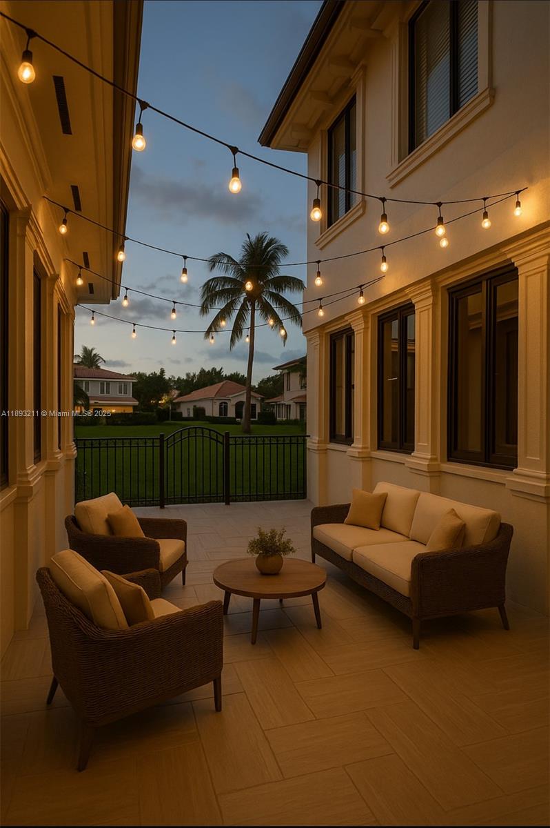 7722 Southwest 188th Terrace Cutler Bay, FL 33157 - Photo 4 of 89 a outdoor living space with furniture and a fireplace