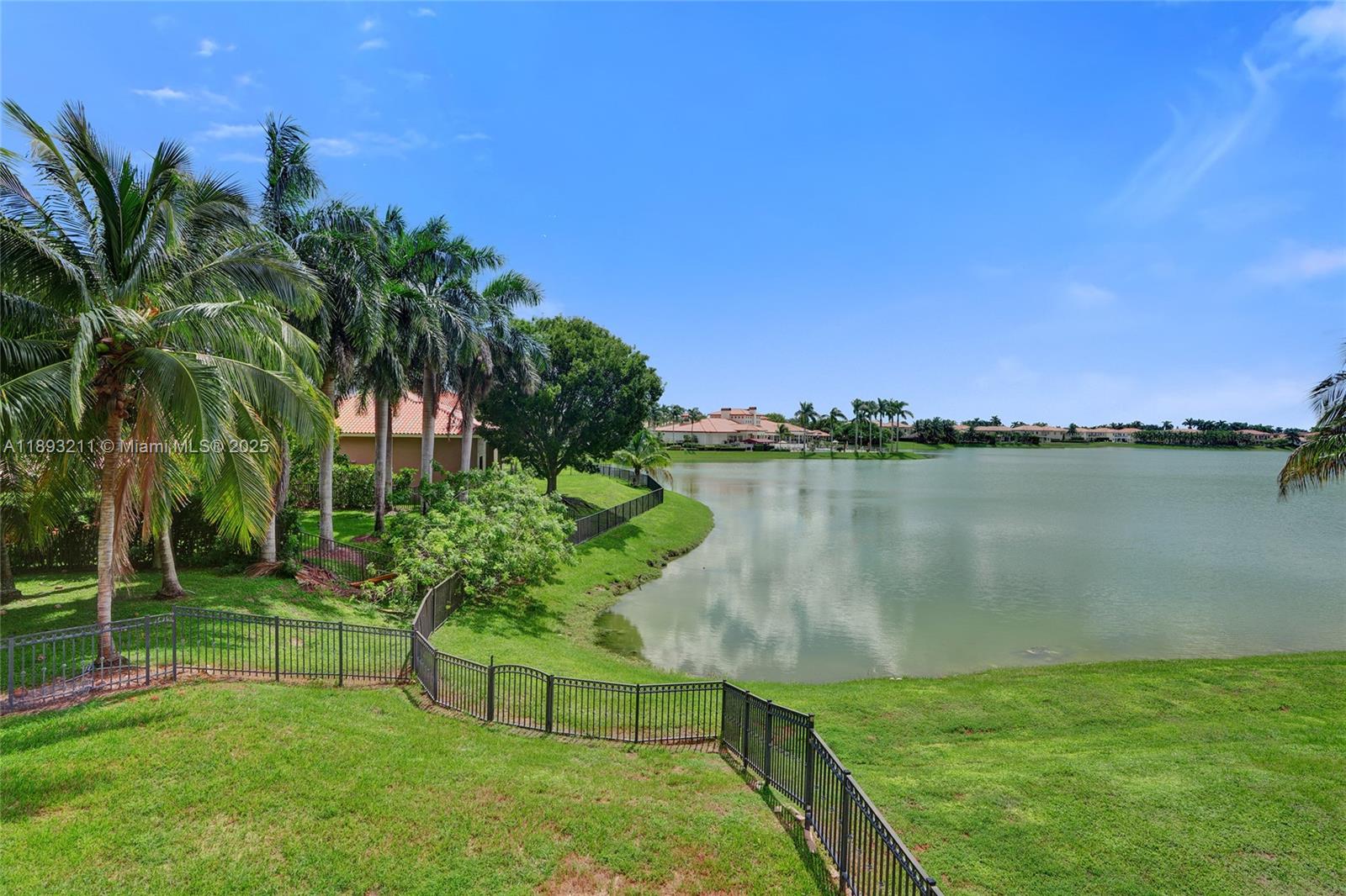 7722 Southwest 188th Terrace Cutler Bay, FL 33157 - Photo 41 of 89 a view of a lake with a big yard