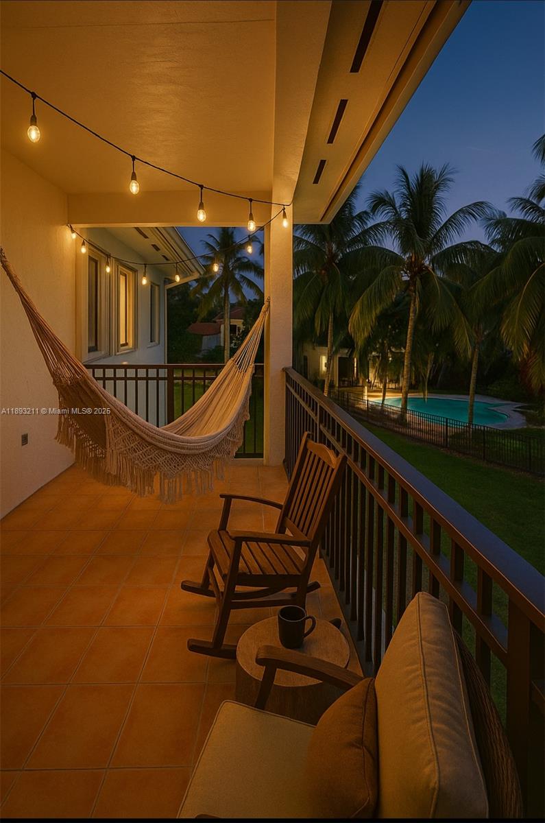 7722 Southwest 188th Terrace Cutler Bay, FL 33157 - Photo 5 of 89 a view of swimming pool with a patio and a garden