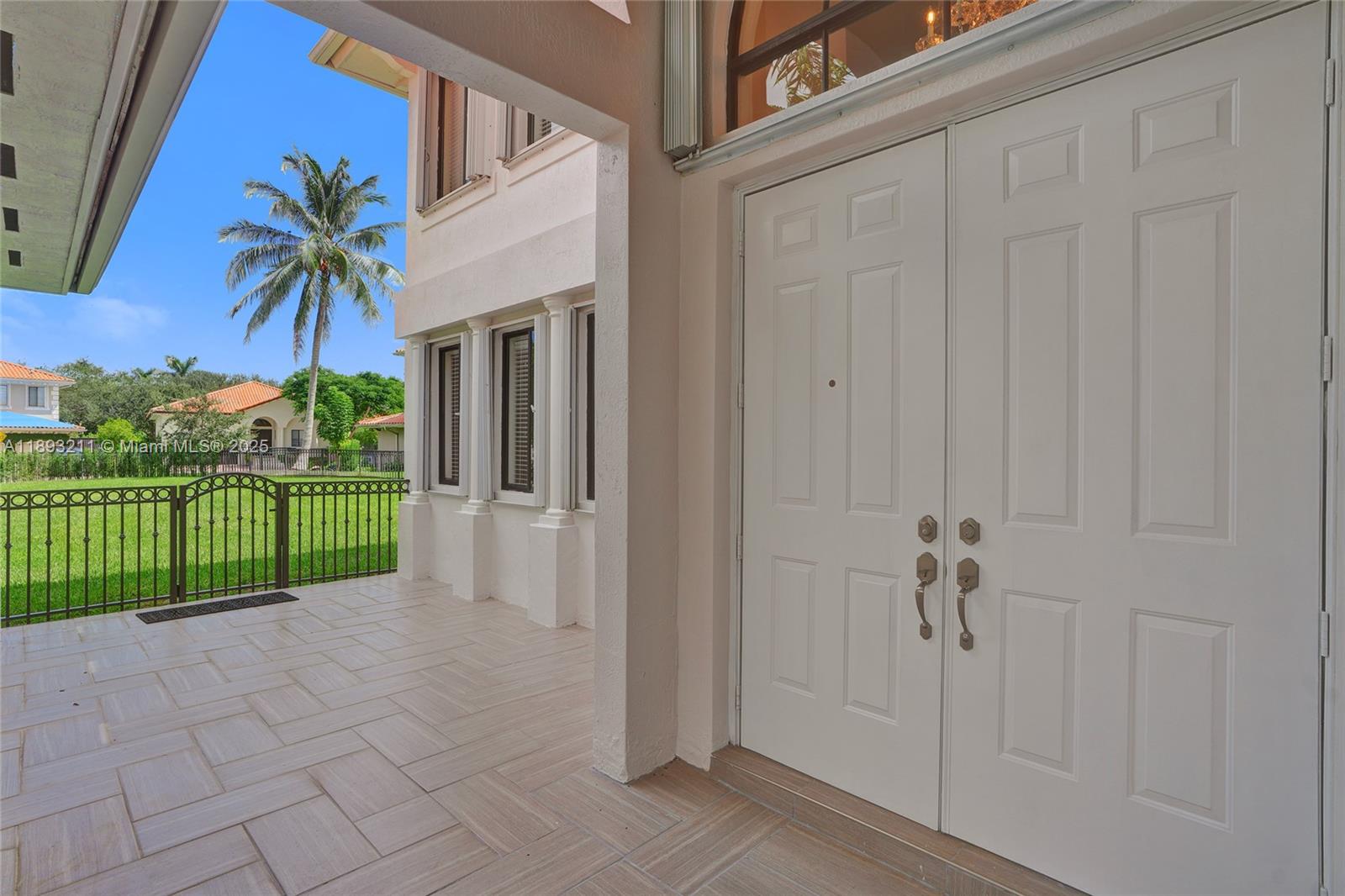 7722 Southwest 188th Terrace Cutler Bay, FL 33157 - Photo 68 of 89 a view of a house with a porch