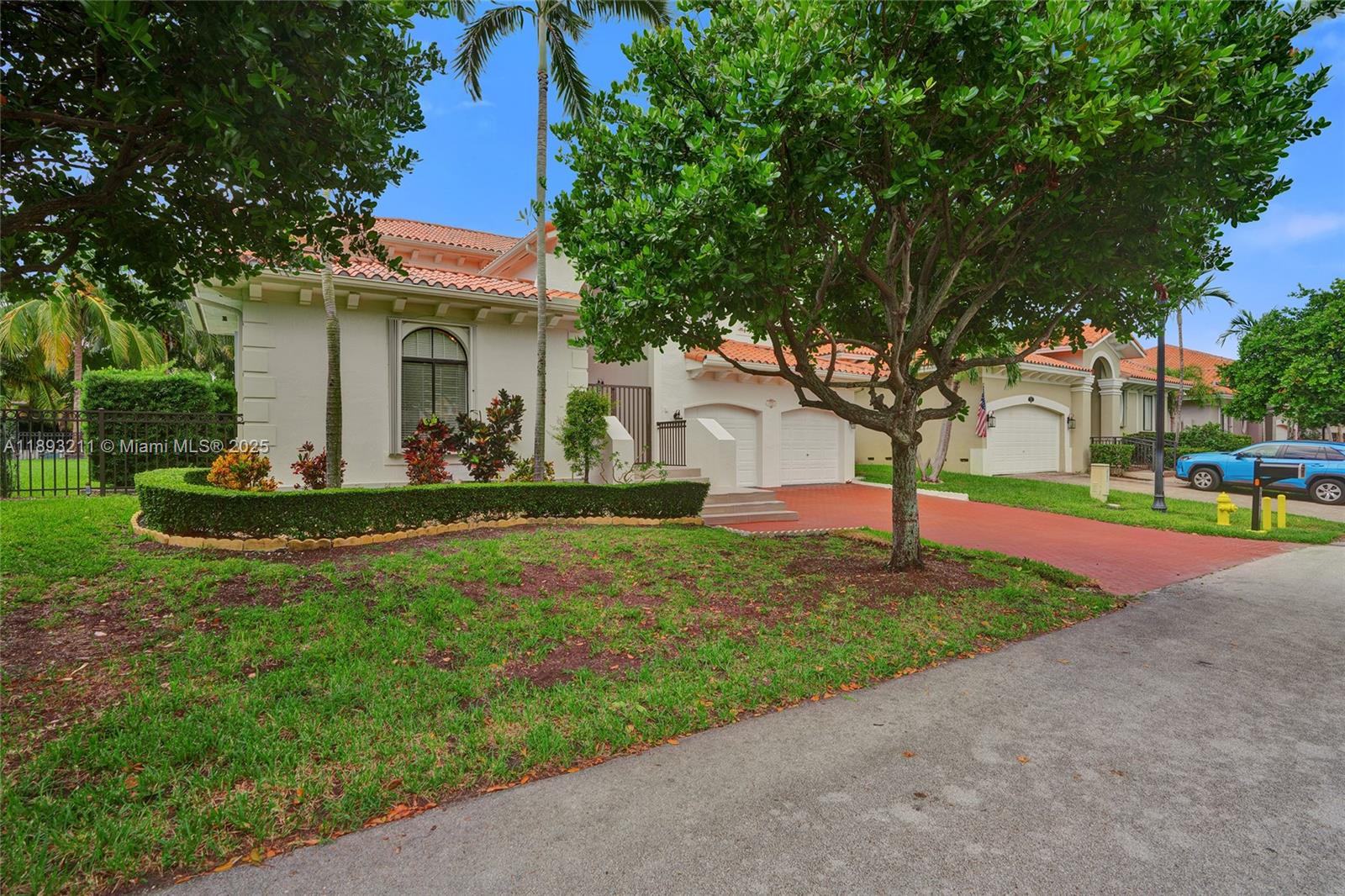 7722 Southwest 188th Terrace Cutler Bay, FL 33157 - Photo 88 of 89 a front view of house with yard and green space