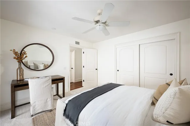 a bathroom with a toilet sink and shower