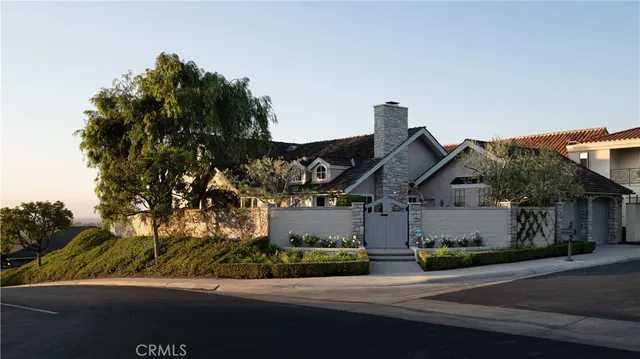an aerial view of house with yard swimming pool and outdoor seating