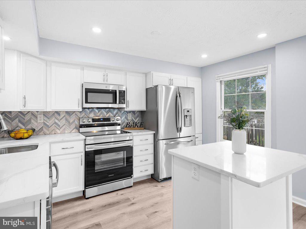 15 Ramsgate Court Halethorpe, MD 21227 - Photo 12 of 48 Open kitchen designed for living and entertaining