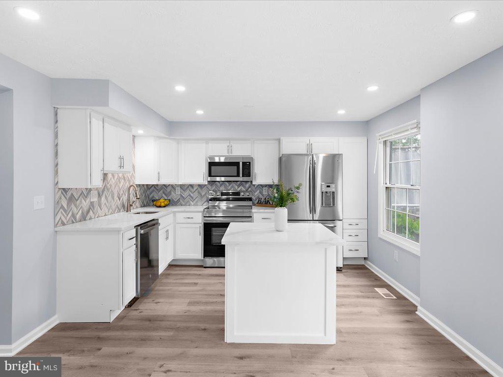 15 Ramsgate Court Halethorpe, MD 21227 - Photo 13 of 48 Shaker style cabinets offer plenty of storage