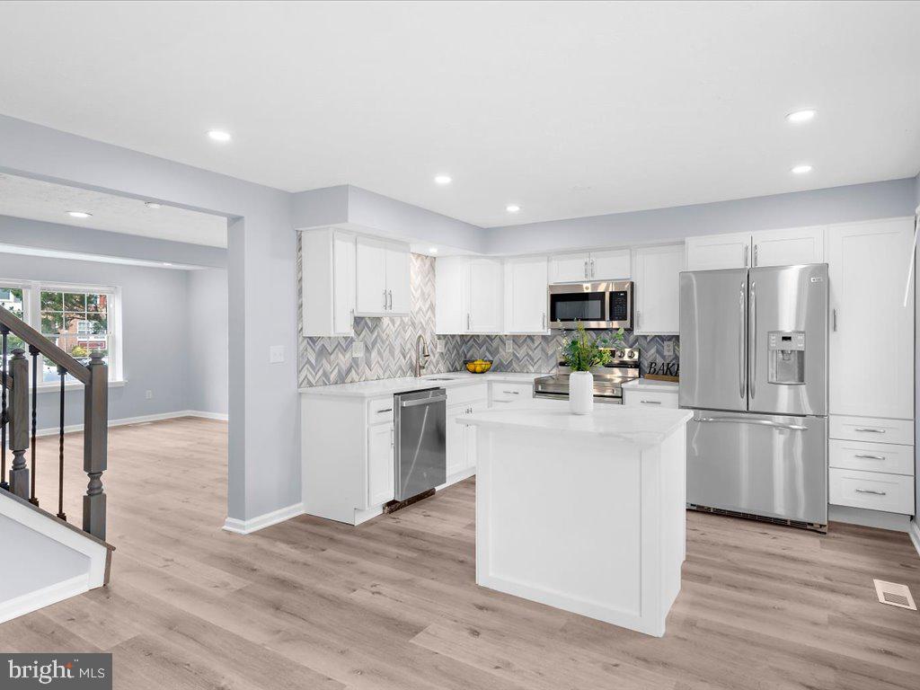 15 Ramsgate Court Halethorpe, MD 21227 - Photo 15 of 48 Stainless steel appliances and quartz counters
