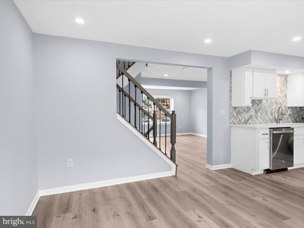 15 Ramsgate Court Halethorpe, MD 21227 - Photo 48 of 48 Open staircase enhances the open floor plan