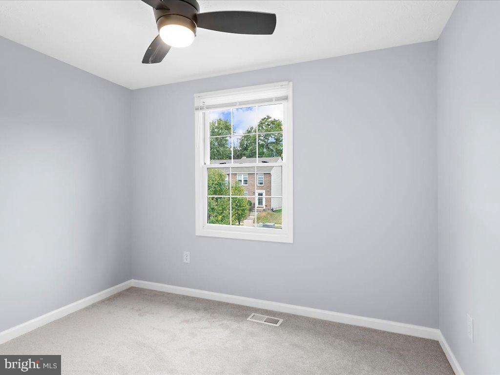 15 Ramsgate Court Halethorpe, MD 21227 - Photo 32 of 48 Bedroom 3 with lighted ceiling fan