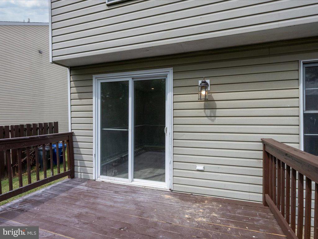 15 Ramsgate Court Halethorpe, MD 21227 - Photo 41 of 48 Sliding door access from dining area to deck