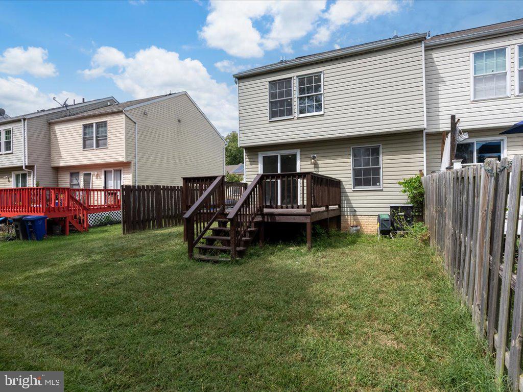 15 Ramsgate Court Halethorpe, MD 21227 - Photo 43 of 48 Steps from deck lead to back yard