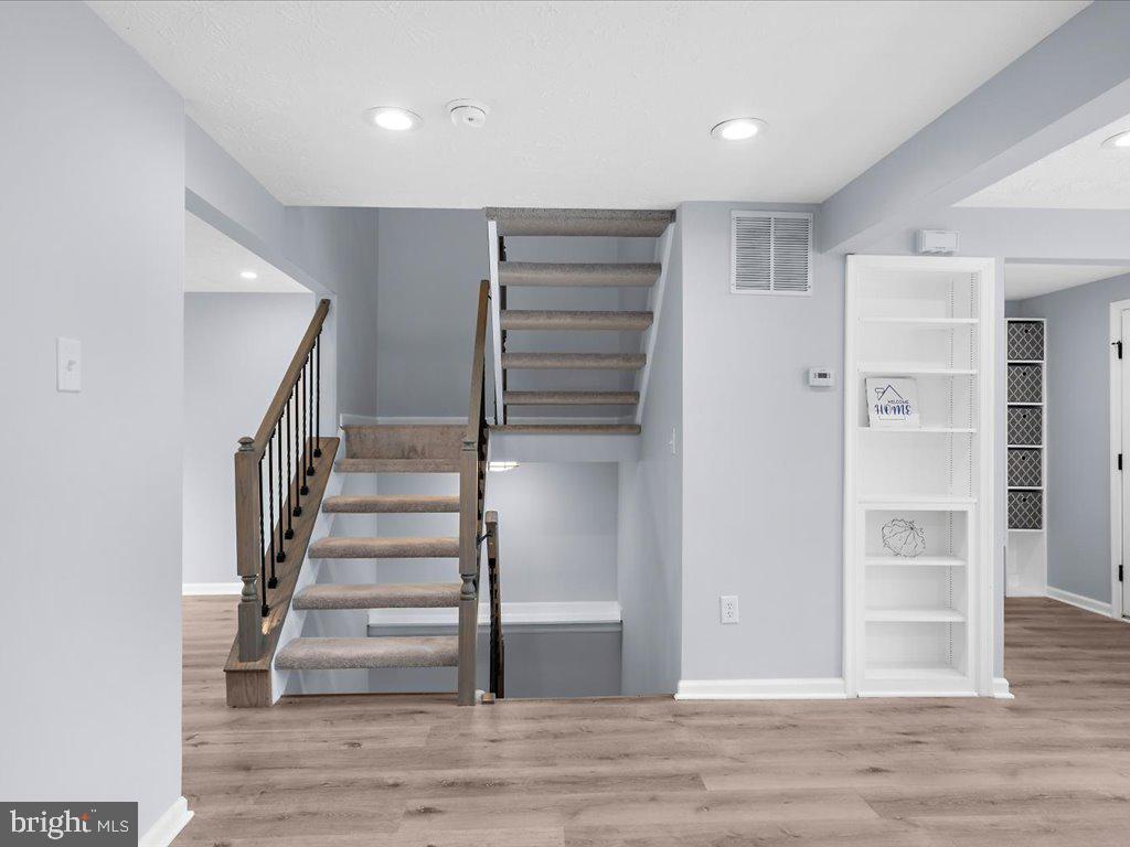 15 Ramsgate Court Halethorpe, MD 21227 - Photo 7 of 48 Modern open staircase to upper and lower levels