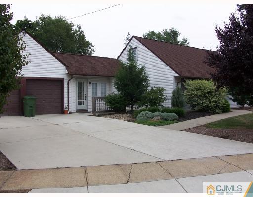 40 Sturgis Road Edison, NJ 08817 - Photo 1 of 10 a view of a house with a yard