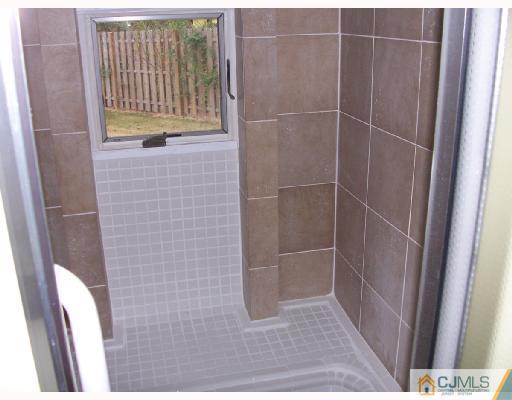 40 Sturgis Road Edison, NJ 08817 - Photo 8 of 10 a bathroom with a shower