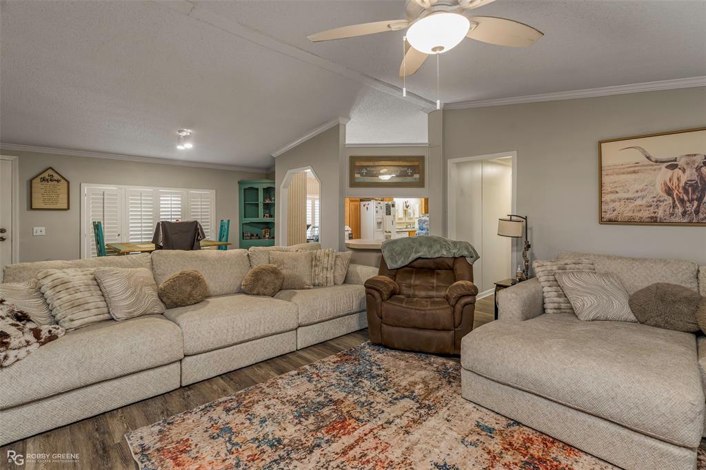 8273 Godfrey Road Shreveport, LA 71129 - Photo 4 of 27 Wood-finish flooring throughout