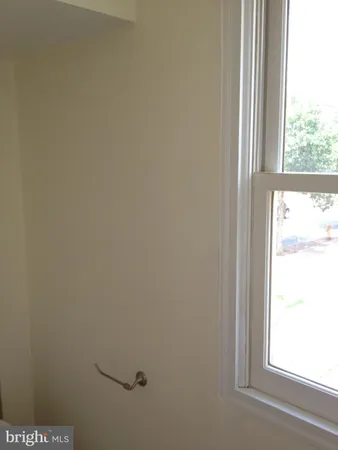 a view of a window in an empty room