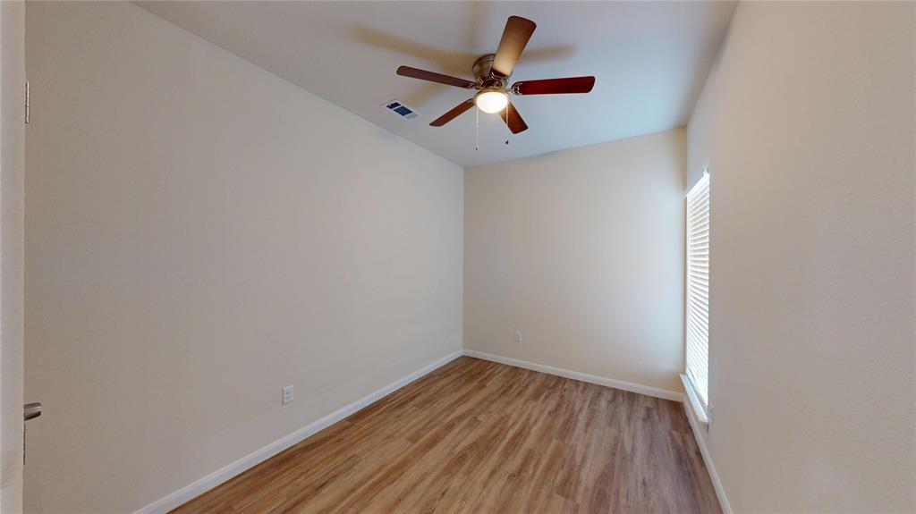18636 Doubletree Drive Justin, TX 76247 - Photo 11 of 35 wooden floor in an empty room