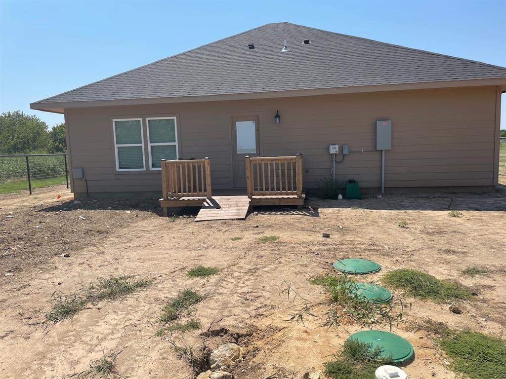 18636 Doubletree Drive Justin, TX 76247 - Photo 20 of 35 a front view of a house with a yard