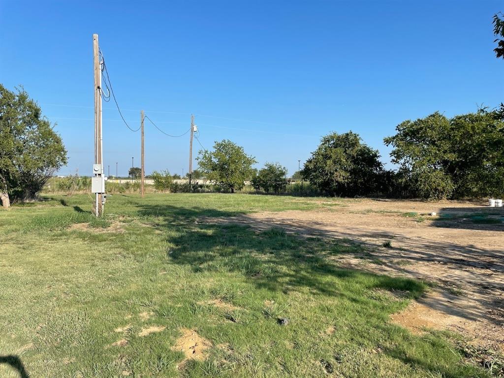 18636 Doubletree Drive Justin, TX 76247 - Photo 28 of 35 a view of a garden with a palm tree